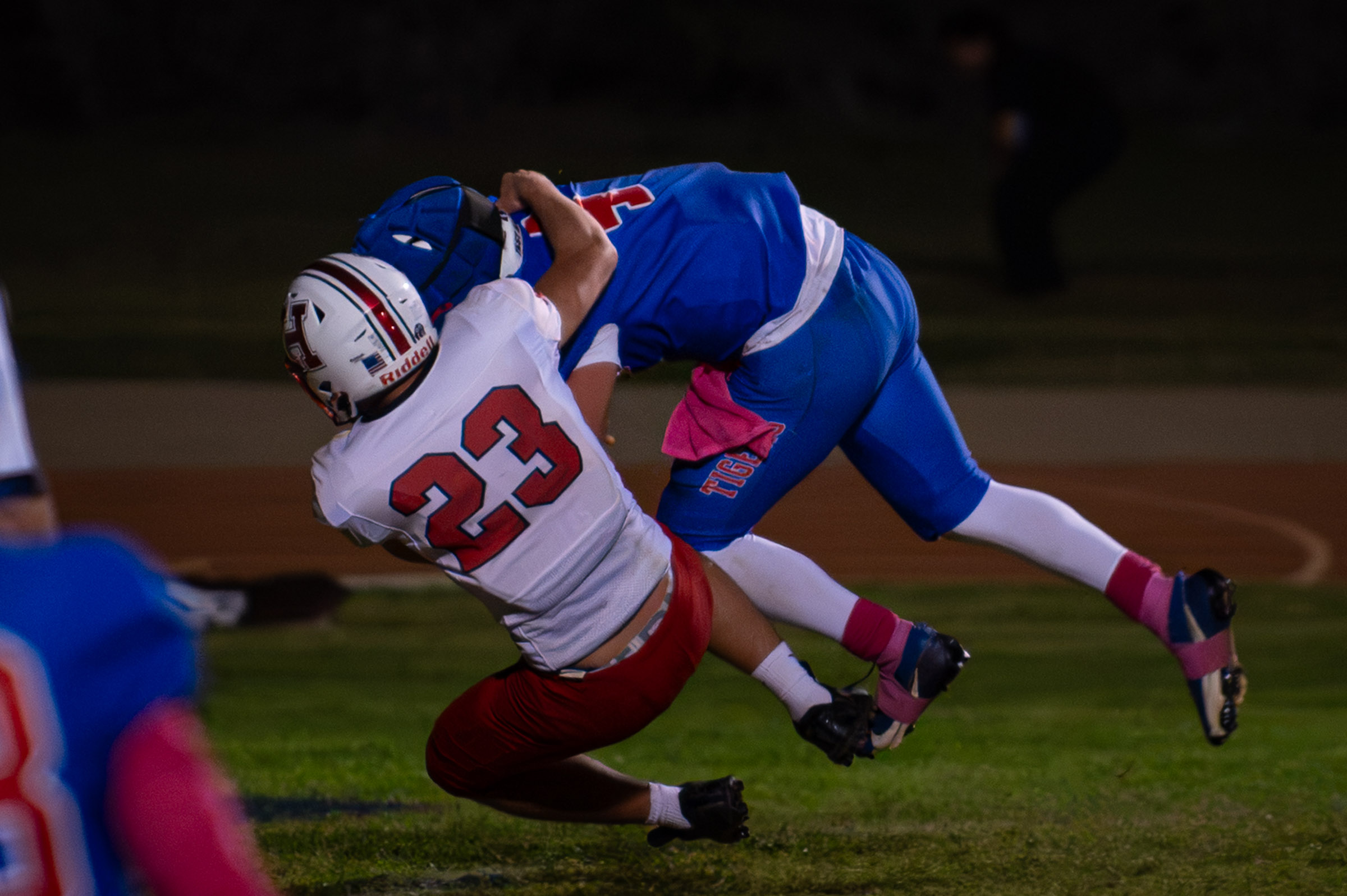 Hot Springs quarterback Zaiden Baker (#4) crosses the goal line for a touchdown while being tackled by Hatch Valley’s Josh Estrada (#23).