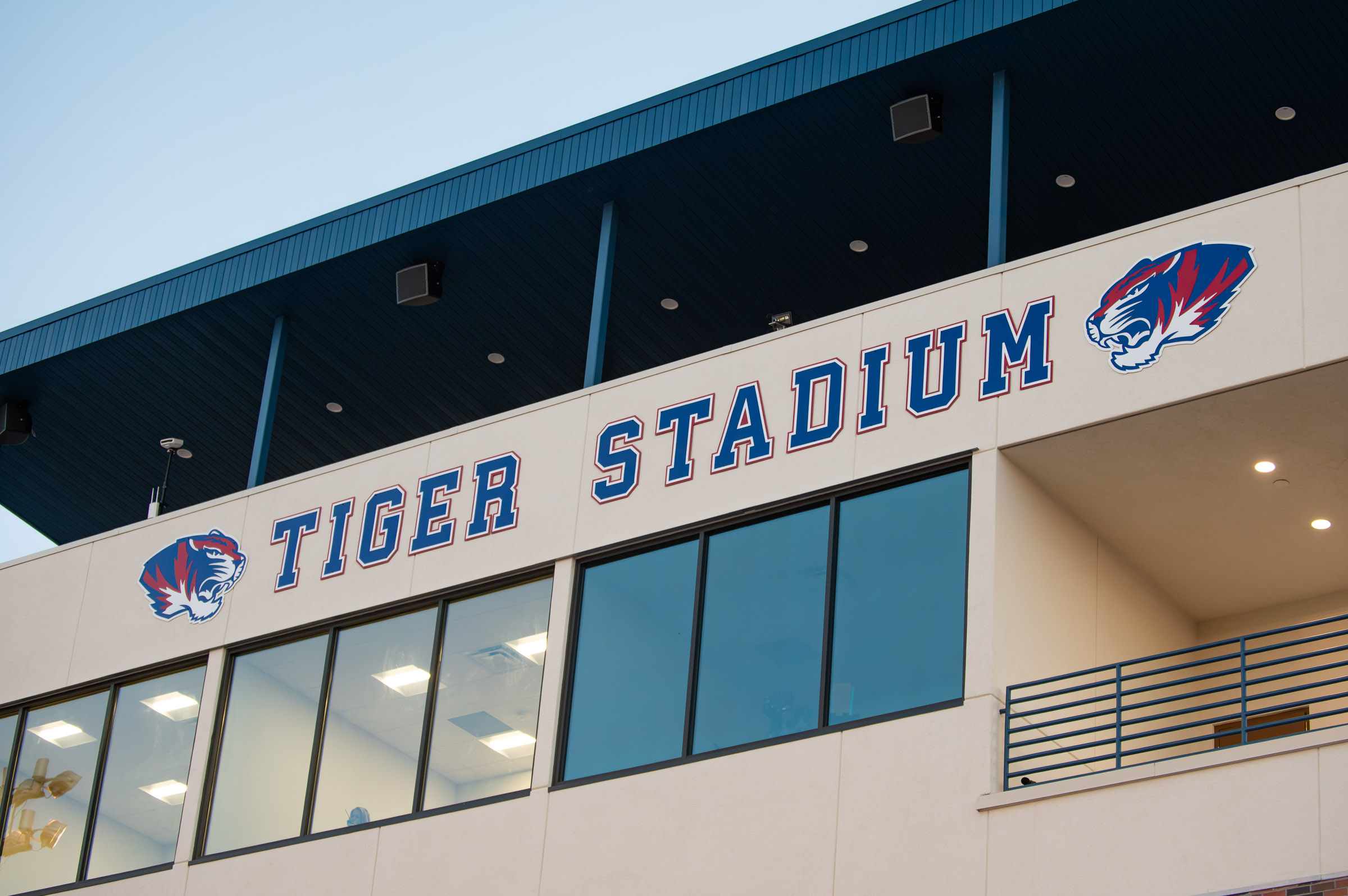 The Tiger Stadium press box at Hot Springs High School, featuring Tigers logos and “Tiger Stadium” lettering.
